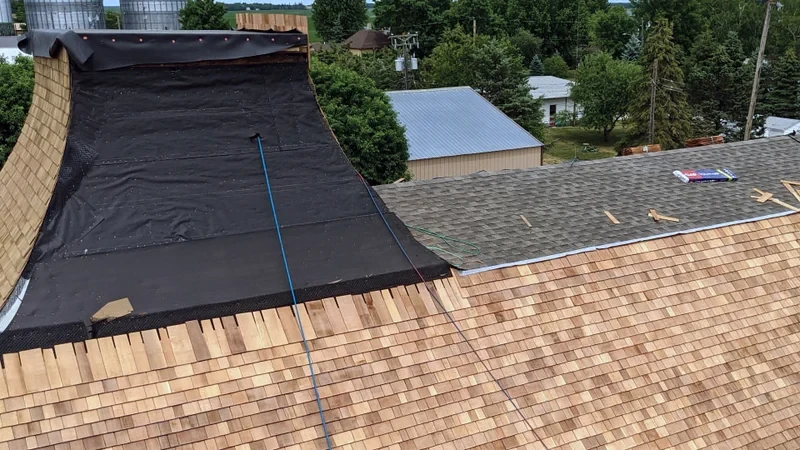 Authentic split wood cedar shake installation craftsmanship and underlayment in Clark County